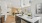  A modern kitchen with a white countertop and a large island.