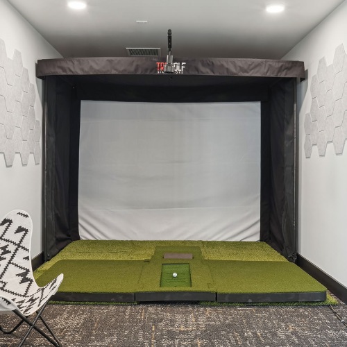 Golf Simulator golf simulator in well lit room