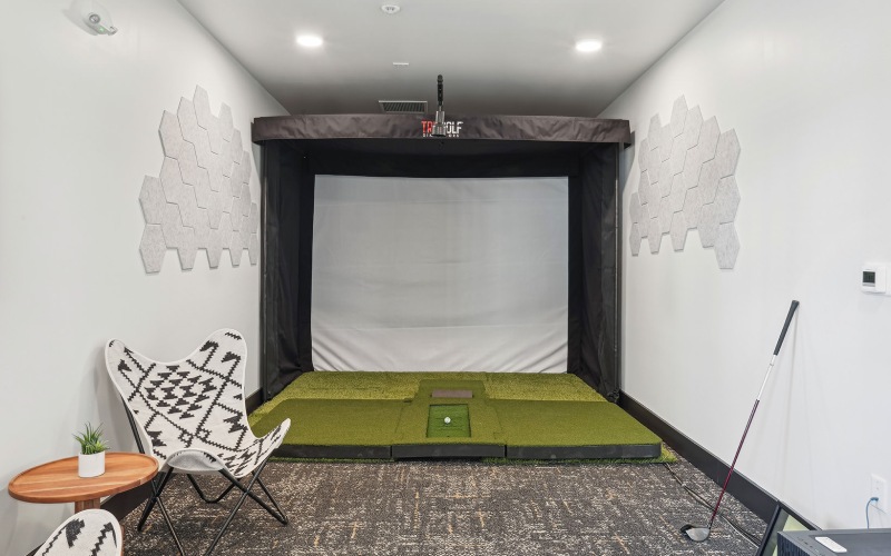 golf simulator in well lit room