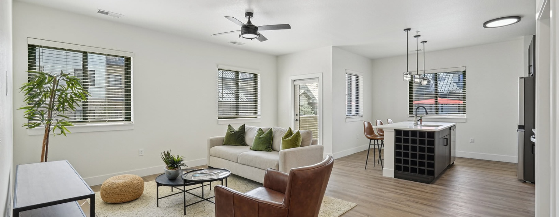 open concept living room with windows